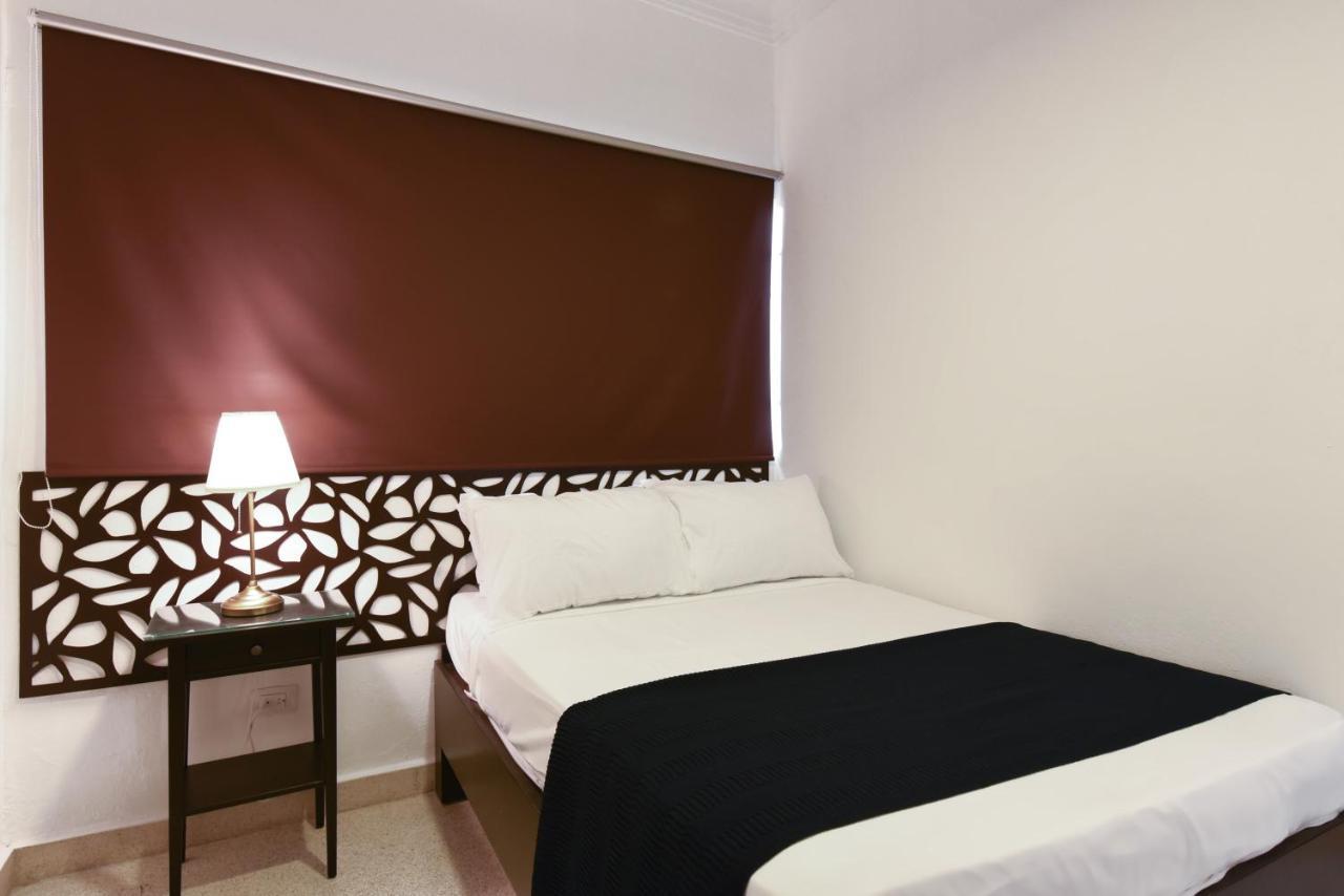 Ph 19 Guesthouse Hotel In Gazcue Santo Domingo Habitación foto