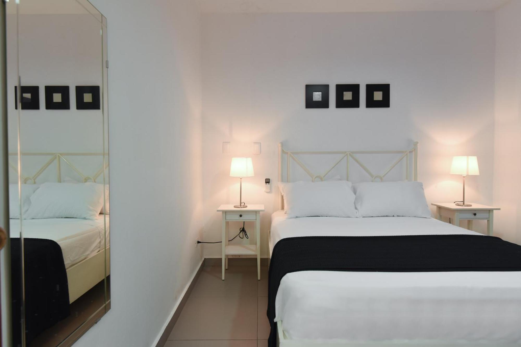 Ph 19 Guesthouse Hotel In Gazcue Santo Domingo Habitación foto