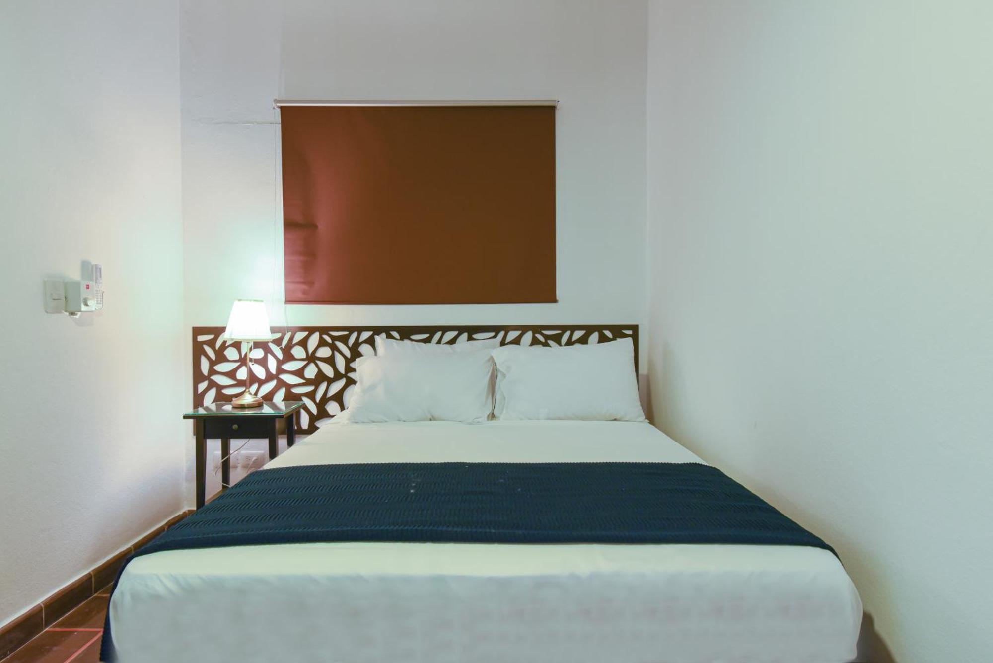 Ph 19 Guesthouse Hotel In Gazcue Santo Domingo Habitación foto
